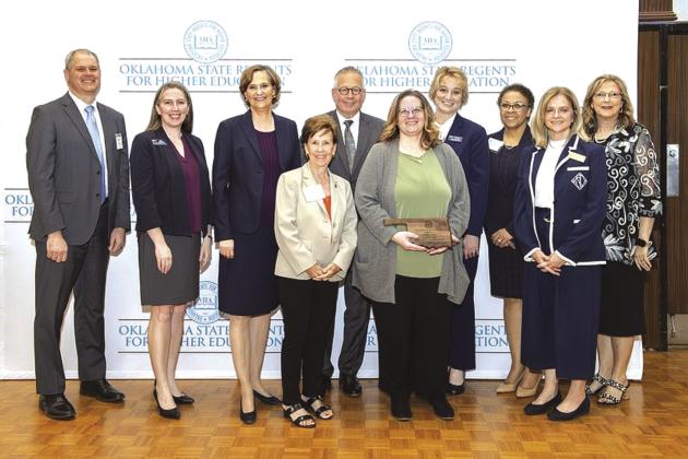 Front row from left are State Regent Ann Holloway and INTEGRIS Health Manager, Office of Nursing Support Sandy Hill. Back row are SWOSU Provost Joel Kendall, SWOSU Research Analyst Lisa Thiessen, Chancellor Allison D. Garrett, Regent Jack Sherry, SWOSU President Diana Lovell, INTEGRIS Health Director of HR Strategy Kimberly Brown, RUSO Executive Director Sheridan McCaffree, and RUSO Regent Jane McDermott.